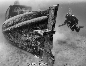 Small Boat wreck and diver, Wraysbury Lake by Nick Blake 